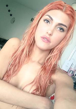 Tranny slut with orange hair in LA